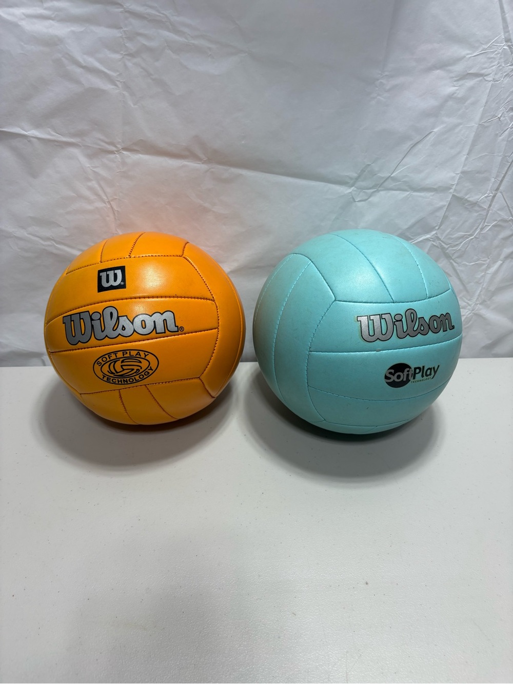 Two Wilson Soft Play Volleyballs